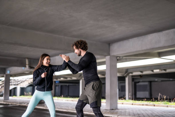 istock Young athletic couple practicing boxing skills. 1314638501