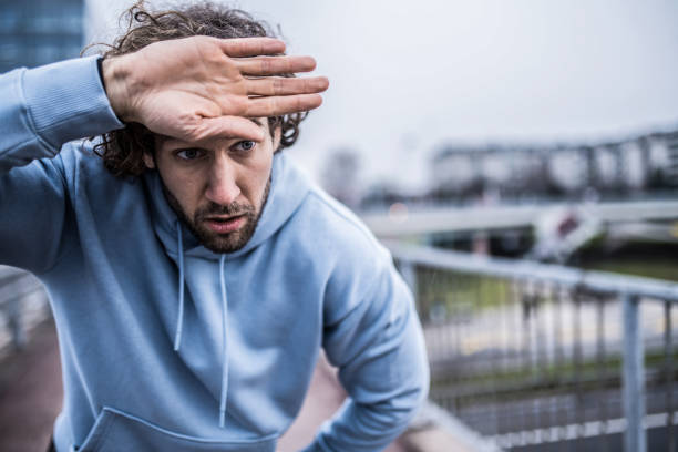 istock Young exhausted sportsman resting. 1314640012