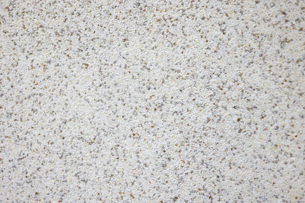 Light-colored flooring with splashes of different colors. Light texture concept
