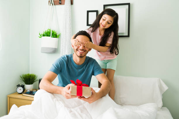 istock Loving father receiving a surprise present 1314658077