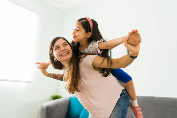 istock Cute girl using her imagination to be a plane 1314659617