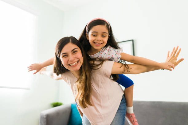 istock Young woman and girl having a fun time 1314659635