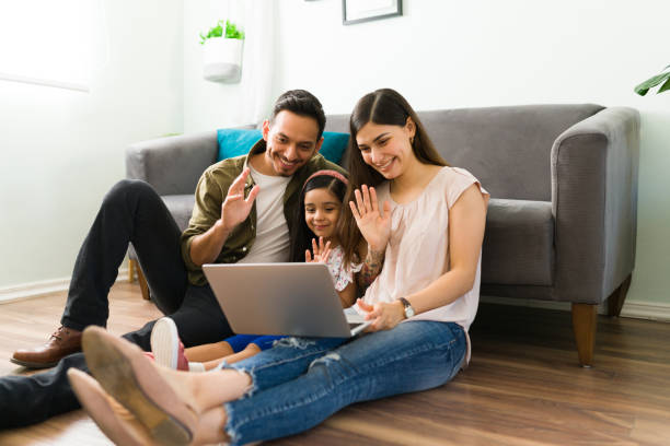 istock Latin family communicating on a video call 1314660844
