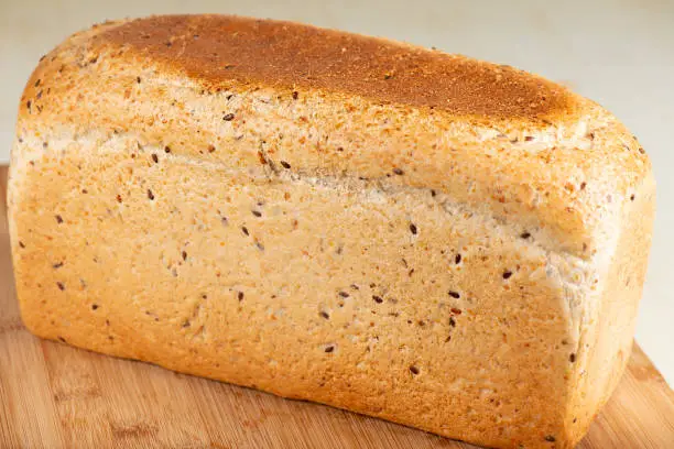 Freshly baked multigrain wholemeal bread loaf