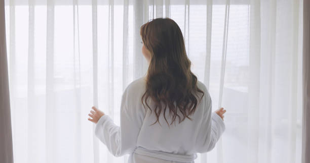 istock asian woman wake up 1314664443