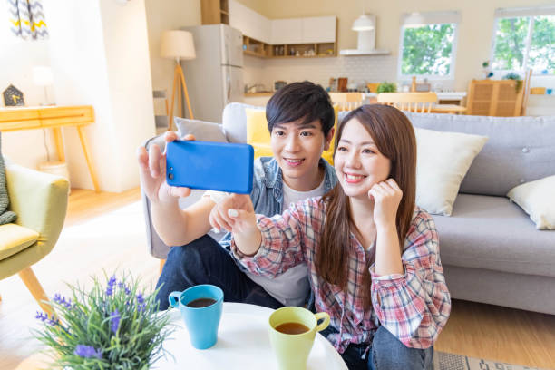 istock asian couple take selfie 1314665577