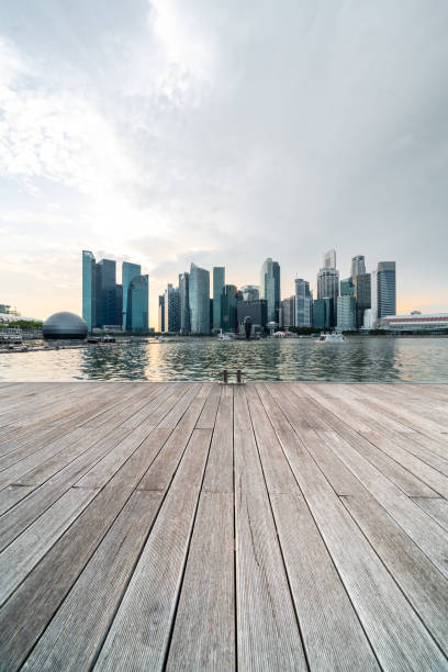 modern skyscrapers in marina bay singapore. - marina bay sparse contemporary skyscraper imagens e fotografias de stock