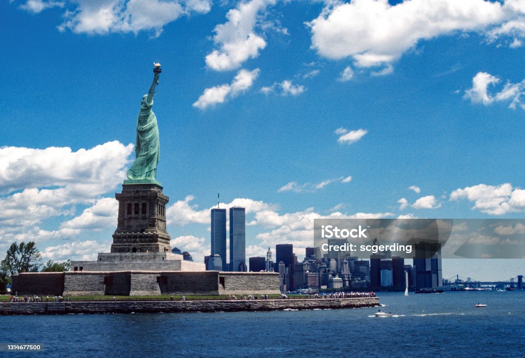 Statue of Liberty & New York Skyline  June 1987 Statue of Liberty & New York Skyline  June 1987. Scanned from Kodachrome 64 slide. New York City Stock Photo
