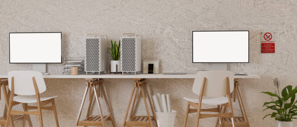 istock Office desk with two computer devices,  supplies, decorations and no smoking sign on the wall, 3D rendering 1314678036