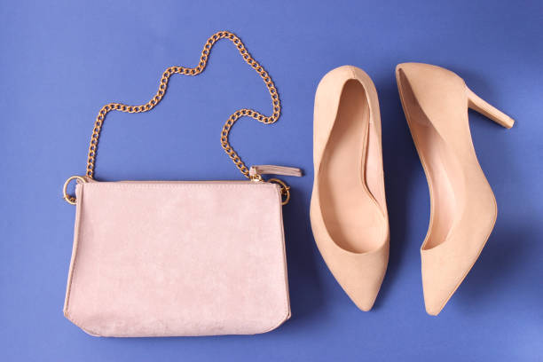 istock women's bag and cosmetics on a colored background 1314678937