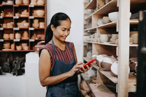 Beautiful Young Lady Making Ceramics At Her Workshop