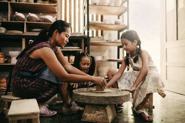 Little girl do pottery