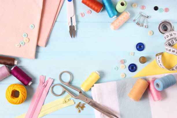 istock sewing accessories close-up. hobbies, fabrics and threads for sewing 1314691172