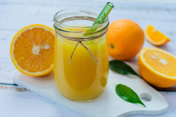 istock Fresh orange juice nv light background. Close-up. 1314691178