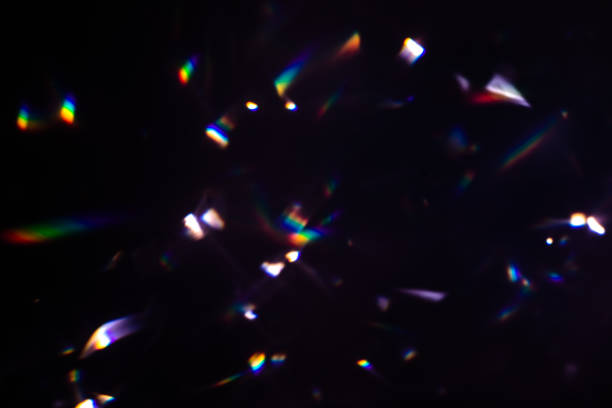 istock colorful warm rainbow crystal light leaks on black background 1314694112