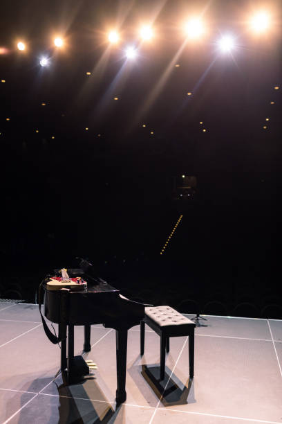 istock black piano on stage. grand piano on the stage before the performance 1314699979