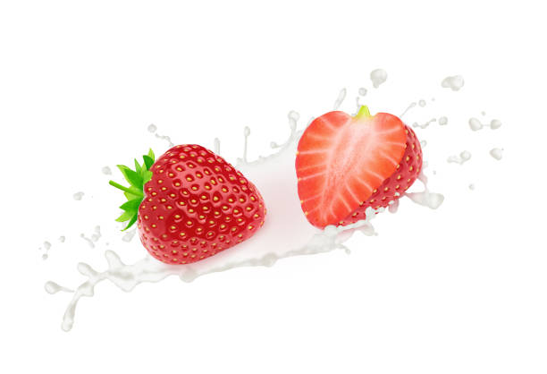 istock Strawberry in milk splashes isolated on white background. 1314709133