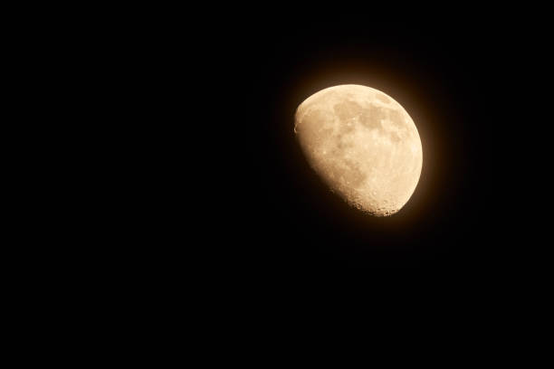 istock Moon two thirds 66%  phase photographed through a long focal telescope. 1314710763