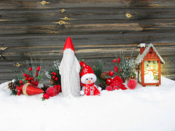 istock christmas lantern fruit berries apple and decoration with fir branches snow 1314715601