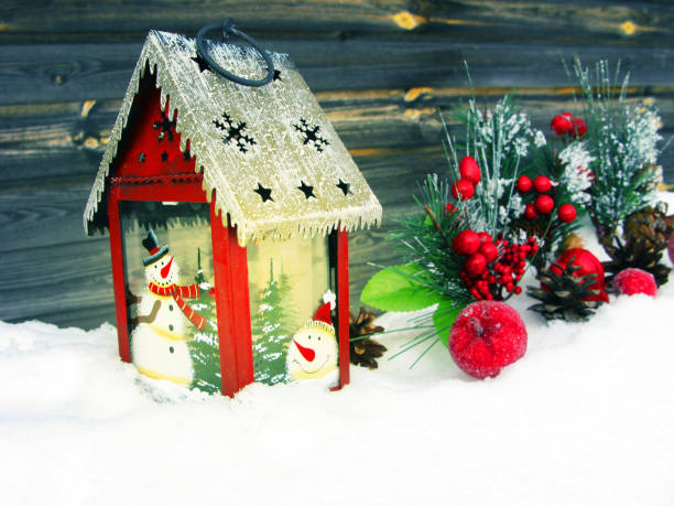 istock christmas lantern fruit berries apple and decoration with fir branches snow 1314717211