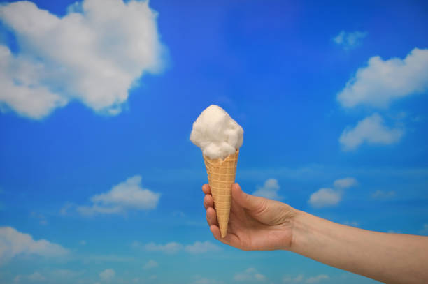 istock Concept Ice cream cone and Cotton like Clouds 1314719215