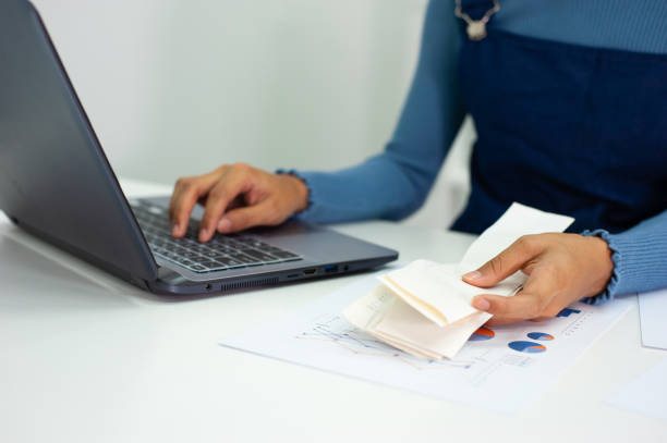 istock A woman working on an accounting laptop. 1314721956