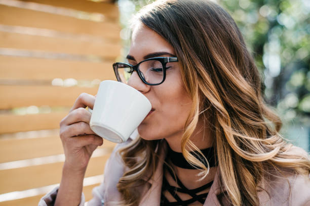 istock Woman drinking coffee in a cafe 1314725365
