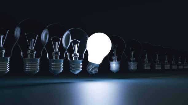 istock Idea concept and light bulb that iluminate on blue background. 1314725783