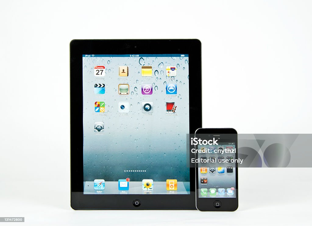 De Apple iPad 3 y iPhone 4 g - Foto de stock de Adulto joven libre de derechos