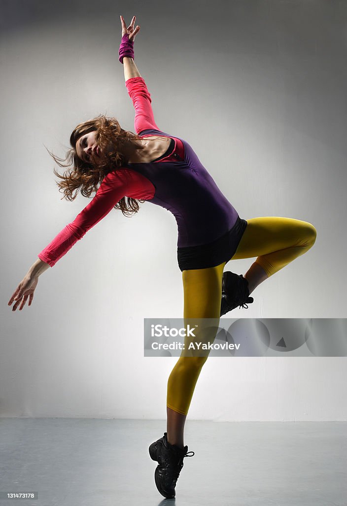 the dancer beautiful modern ballet dancer posing on grey background http://www.ayakovlev.com/lb/jump.jpg Acrobat Stock Photo