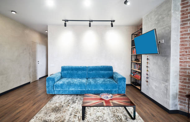 istock Living room with blue sofa in minimalist style. 1314732628