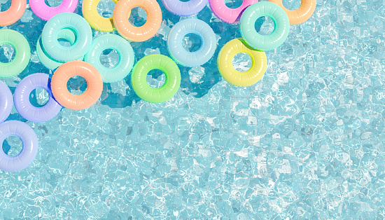 top view of swimming pool with lots of pastel colored floats in the corner. summer time. copy space 3d render [...]
