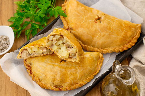 Savoury pastry Cornish pasty filled with chicken and potato