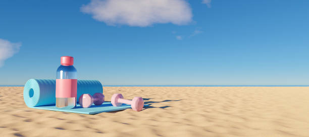 istock exercise mat with water bottle and weights on the beach 1314734723