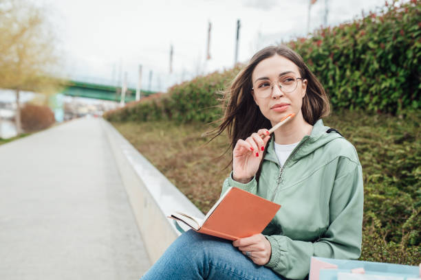 istock Portrait of a beautiful student learning outdoors 1314740344
