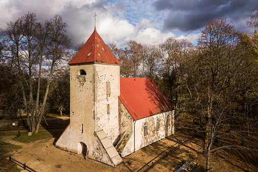 Aerial view of Ivande lutheran church in sunny autumn day, Latvia