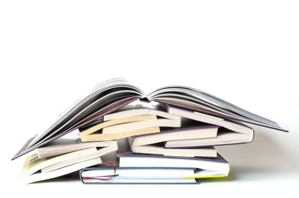 stack of hardcover books on white background - old book stack open imagens e fotografias de stock