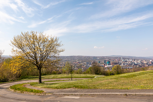 Sheffield, South Yorkshire, England - April 24 2021: A view of the City of Sheffield. Picture taken from Arbourthorne Recreation Ground
