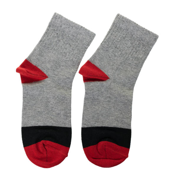istock Grey and red cotton socks isolated on white background 1314744697