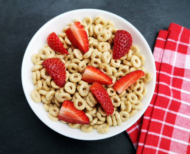 Whole grain cereal rings in a bowl stock photo
