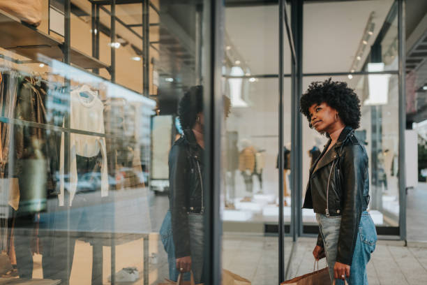 istock A young woman out shopping in the city 1314755708