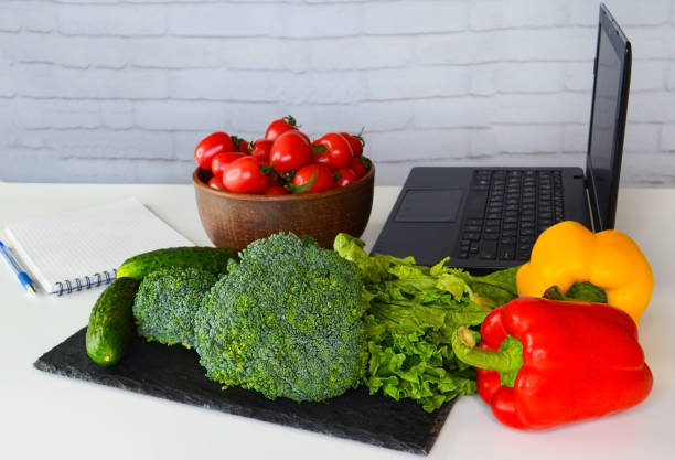 summer vegetables, cooking food courses online with laptop