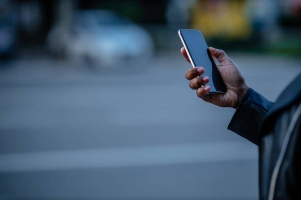 istock Unrecognizable afro woman using phone outdoors 1314757869