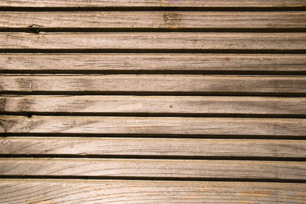 istock Lined wooden board close up, background 1314757898