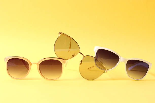 istock set of sunglasses on a colored background top view. 1314765996
