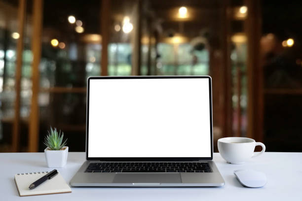 istock Front view of open laptop computer notebook with blank monitor white screen display on work table desk. Workspace office modern for job business online communication technology in shop or home indoor. 1314768158