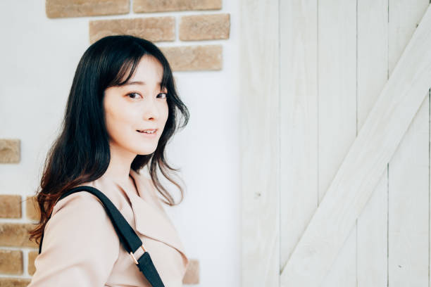 istock Young Woman Leaving Home with smile 1314768246