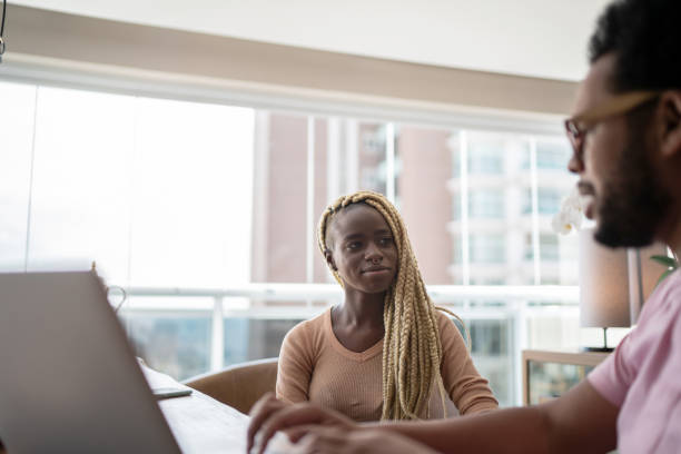 istock Financial advisor talking to client or couple doing home finances at home 1314769946