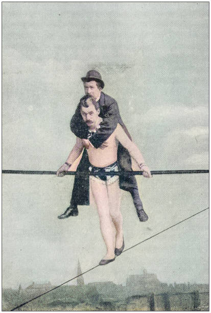 ilustrações, clipart, desenhos animados e ícones de foto antiga: acrobata de andador de corda - tightrope walking circus skill