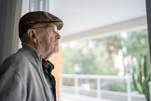 istock Senior man contemplating at home 1314772049